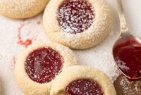 Jam-Kissed Almond Thumbprint Cookies