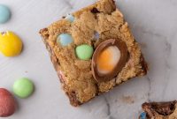 Easter Basket Delights: M&M’s and Cadbury Egg Chocolate Chip Cookie Bars