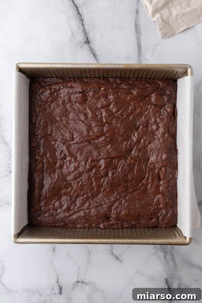 Mastering the World's Best Fudgy Brownies 16 Baked brownie in a pan