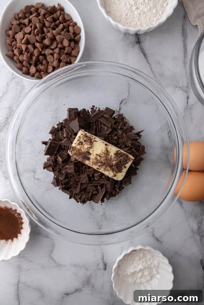 Mastering the World's Best Fudgy Brownies 5 Chopped chocolate with butter and oil in a bowl