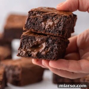 hand holding brown butter brownies