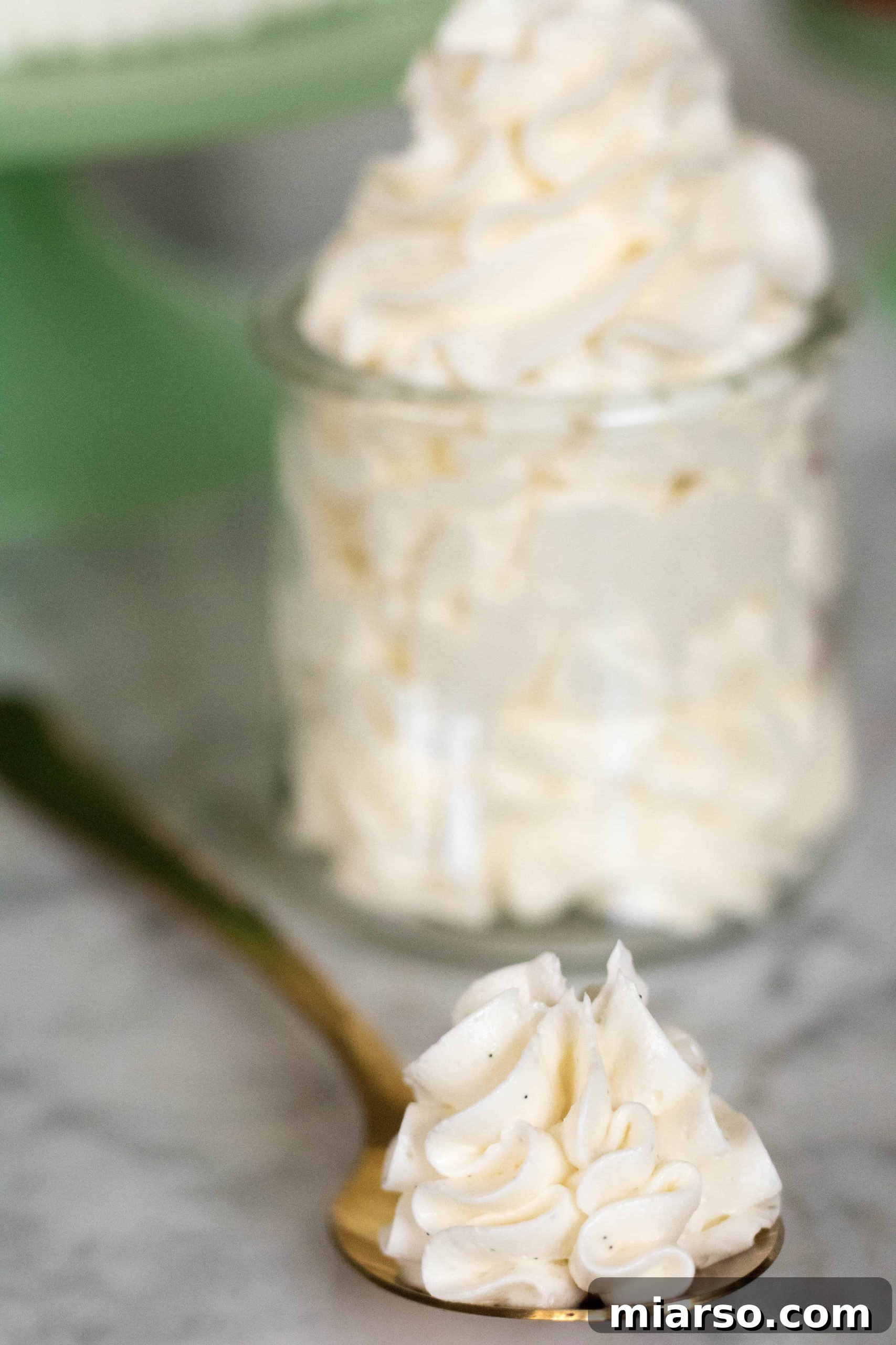 Italian meringue buttercream with visible vanilla beans