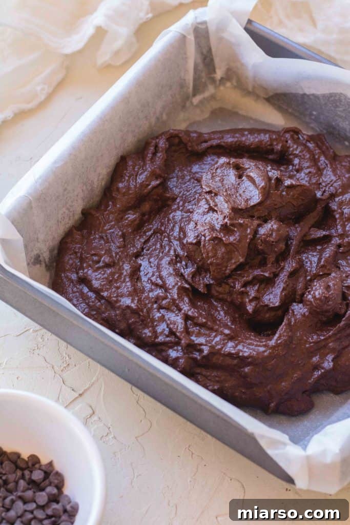 Vegan black bean brownie batter in a baking dish