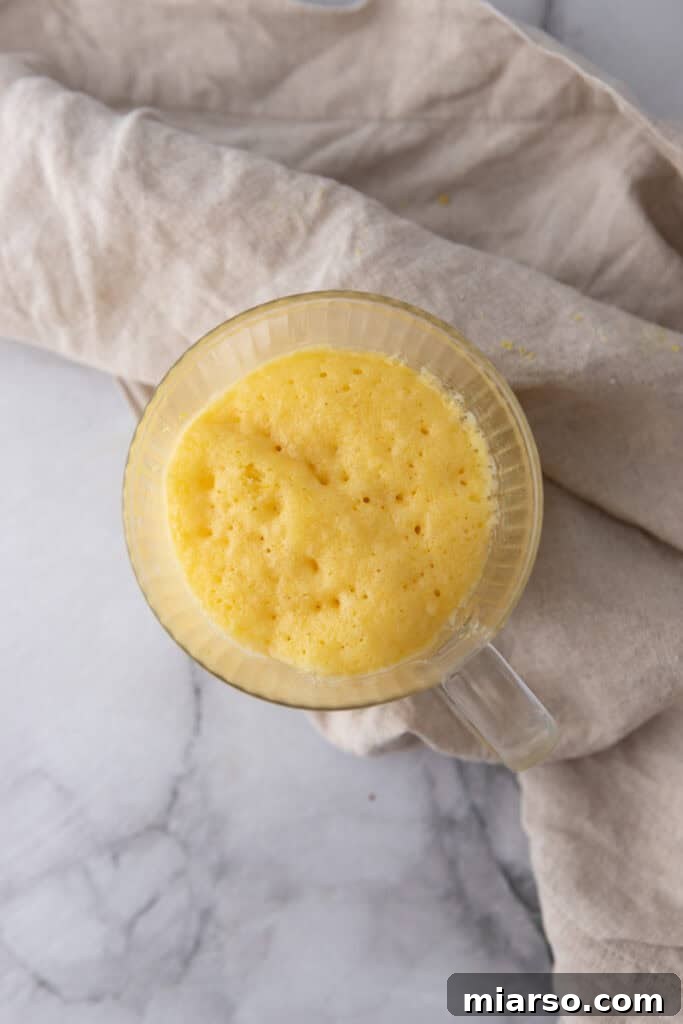 baked batter in a mug