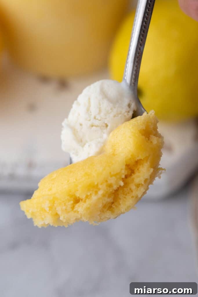 lemon mug cake recipe piece on a spoon