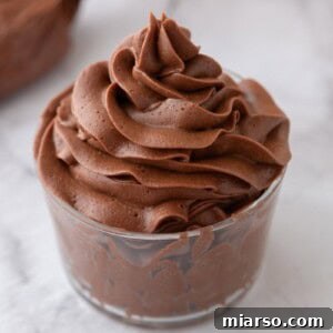 Fudgy Chocolate Frosting (Made in One Bowl) in a cup.