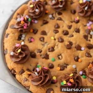 The Ultimate Homemade Chocolate Chip Cookie Cake 17 Decorated chocolate chip cookie cake ready to serve