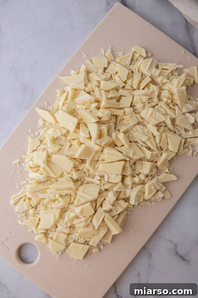 chopped white chocolate on a cutting board