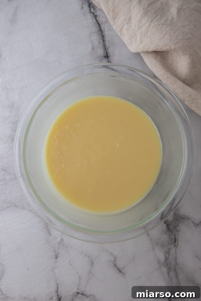 white chocolate and cream mixture after resting, before stirring