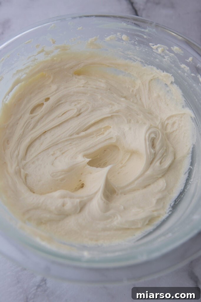 white chocolate ganache recipe poured into a bowl