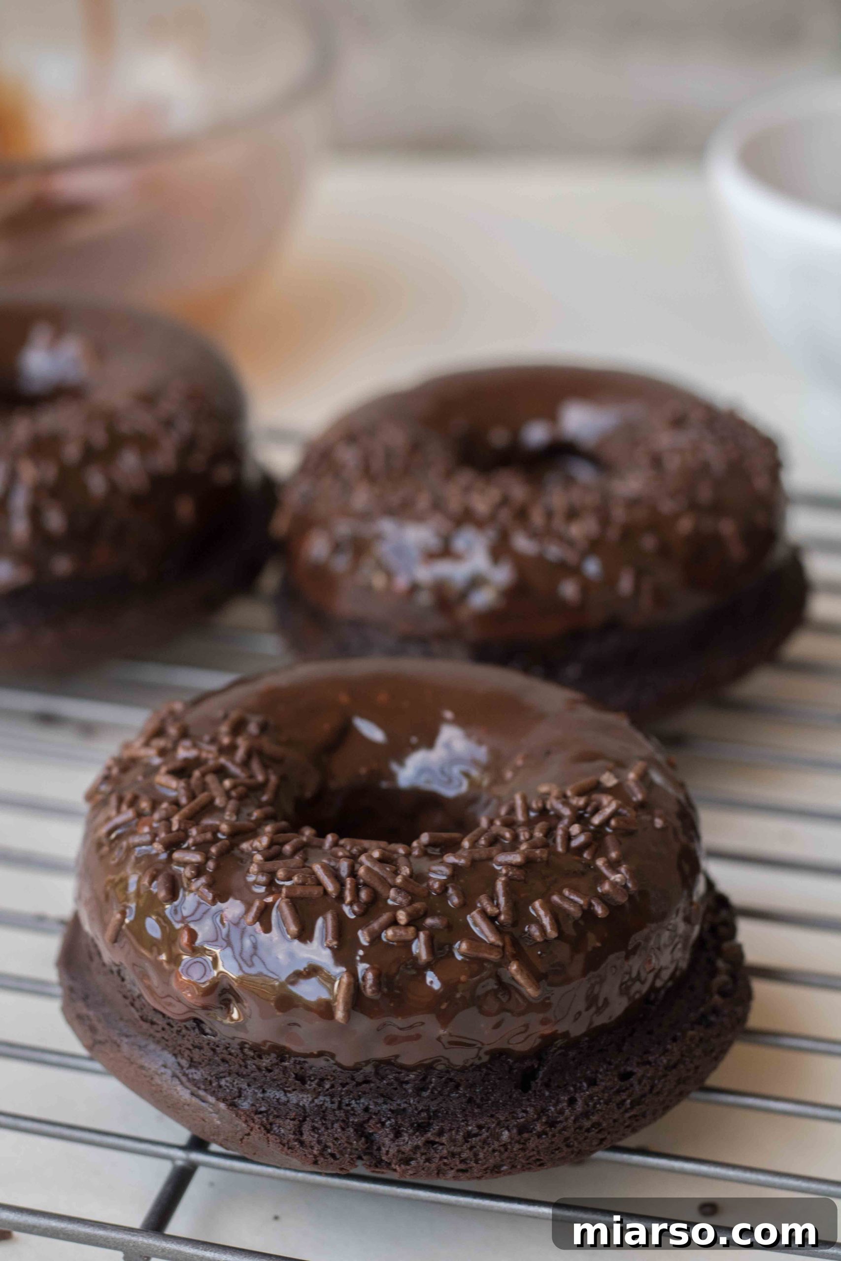 Delicious baked chocolate donuts with chocolate ganache glaze