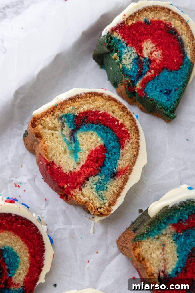 Showstopping Stars and Stripes Bundt Cake 21 Red White and Blue Bundt Cake slice on a plate