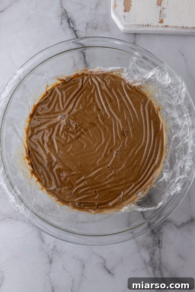 Chilled custard base in a bowl after straining