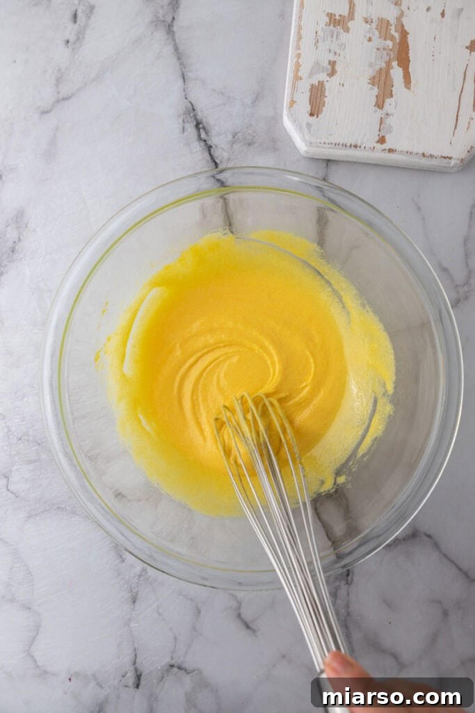 Pale and thick egg yolk and sugar mixture after whisking