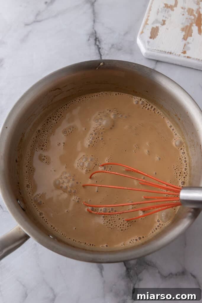 Combined custard mixture in the saucepan, ready for cooking