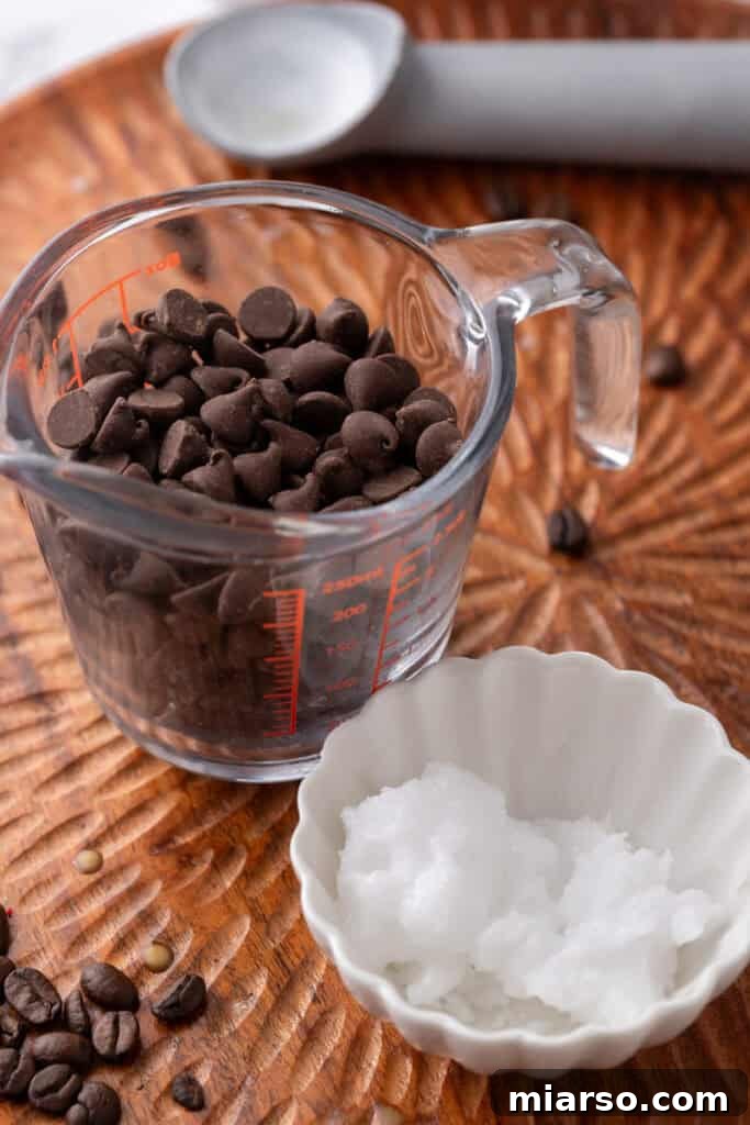 Easy 5-Minute Magic Chocolate Shell for Ice Cream 3 Two simple ingredients for magic chocolate shell recipe: chocolate chips and coconut oil.