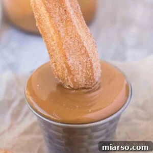 Easy air fryer churros coated in cinnamon sugar.