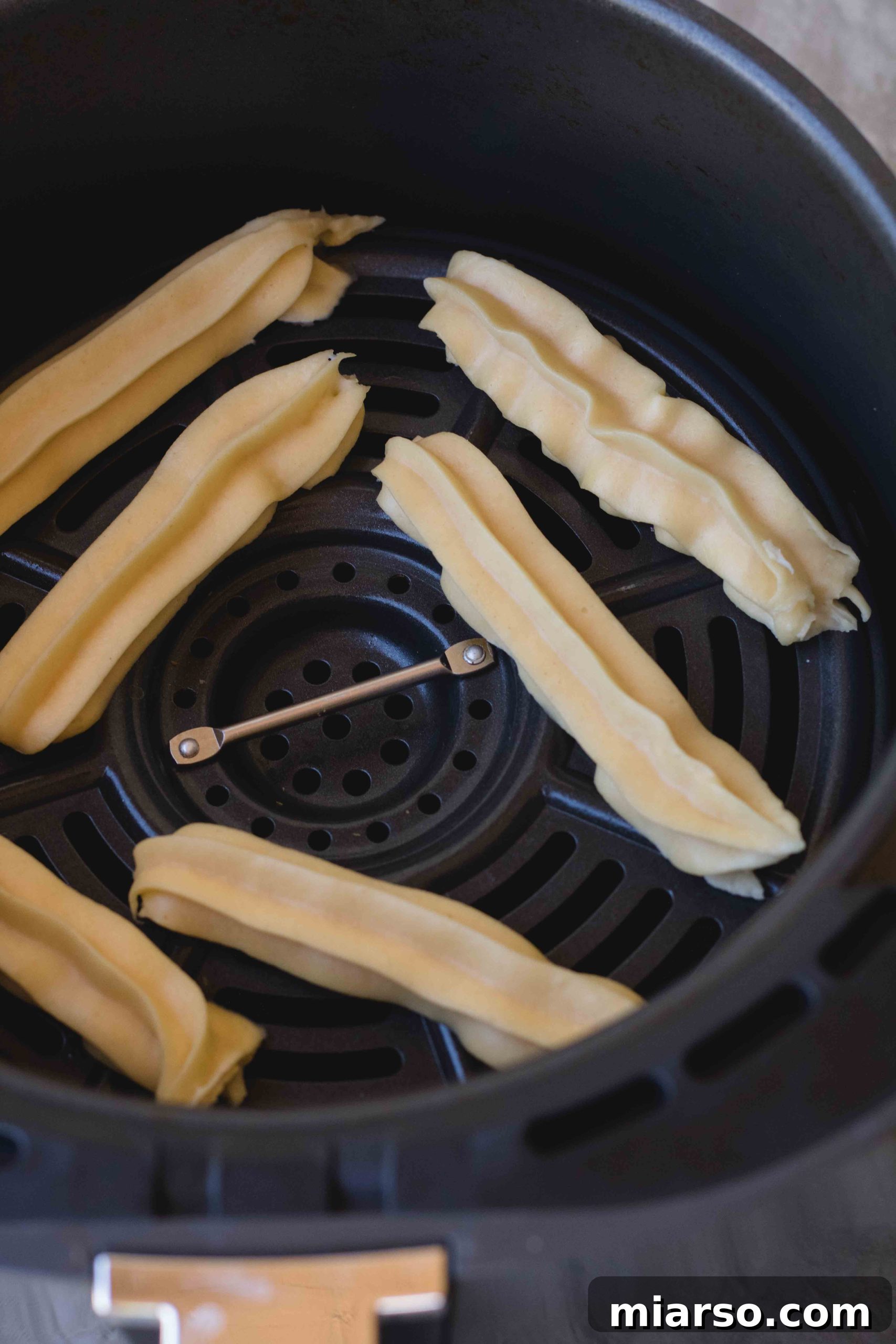 Churro dough after eggs are incorporated, ready for piping.
