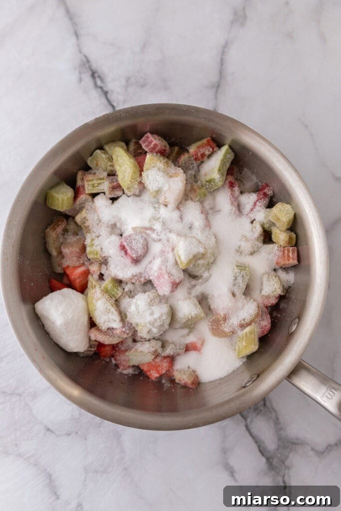 sugar and fruit in a pot