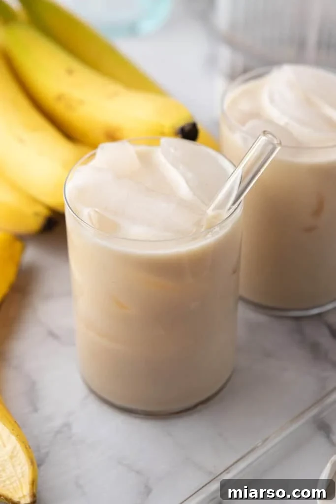 A glass of homemade Korean Banana Milk, ready to drink