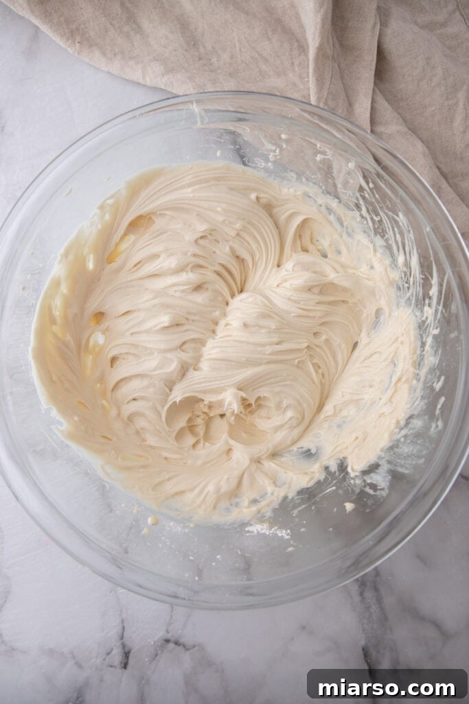 Cream cheese mixture after being beaten until smooth and fluffy