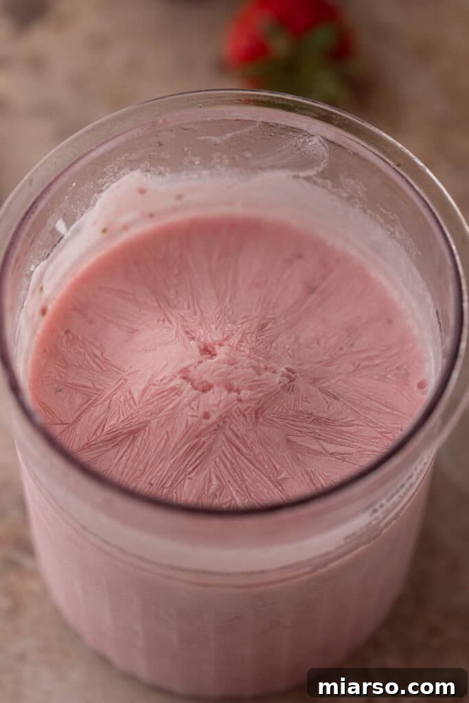 Frozen ice cream base in container
