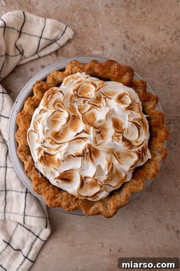 Mastering Chocolate Meringue Pie 19 topping being toasted