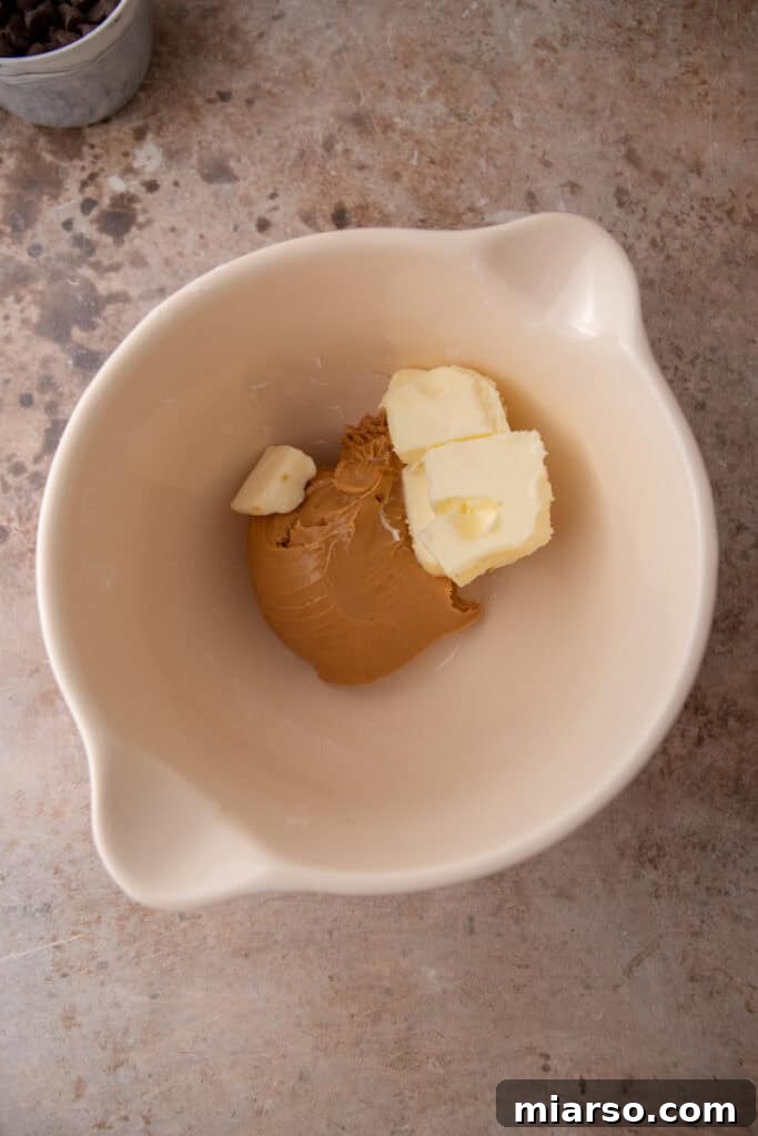 Softened butter and peanut butter in a bowl