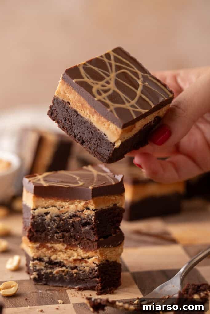 Stacked Buckeye Brownies with a bite taken out