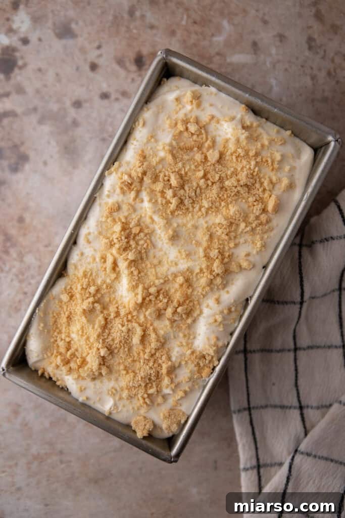 Cream cheese ice cream mixture transferred to a loaf pan