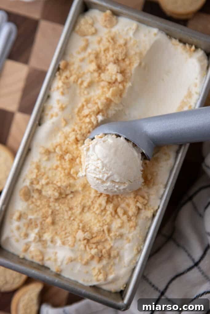 Scoops of frozen No-Churn Cream Cheese Ice Cream in a bowl