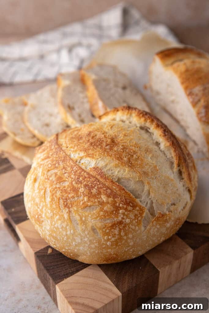 same day sourdough bread recipe on top of a cutting board