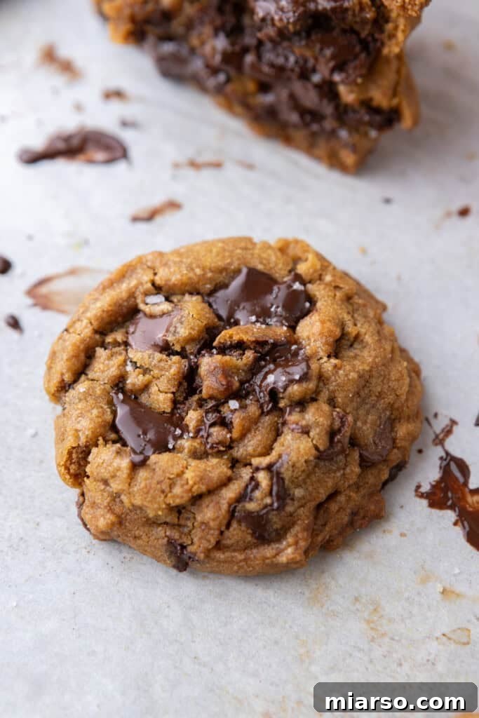 Brown Butter Pumpkin Chocolate Chip Cookies on parchment paper 
