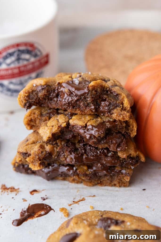 Brown Butter Pumpkin Chocolate Chip Cookies split and stacked