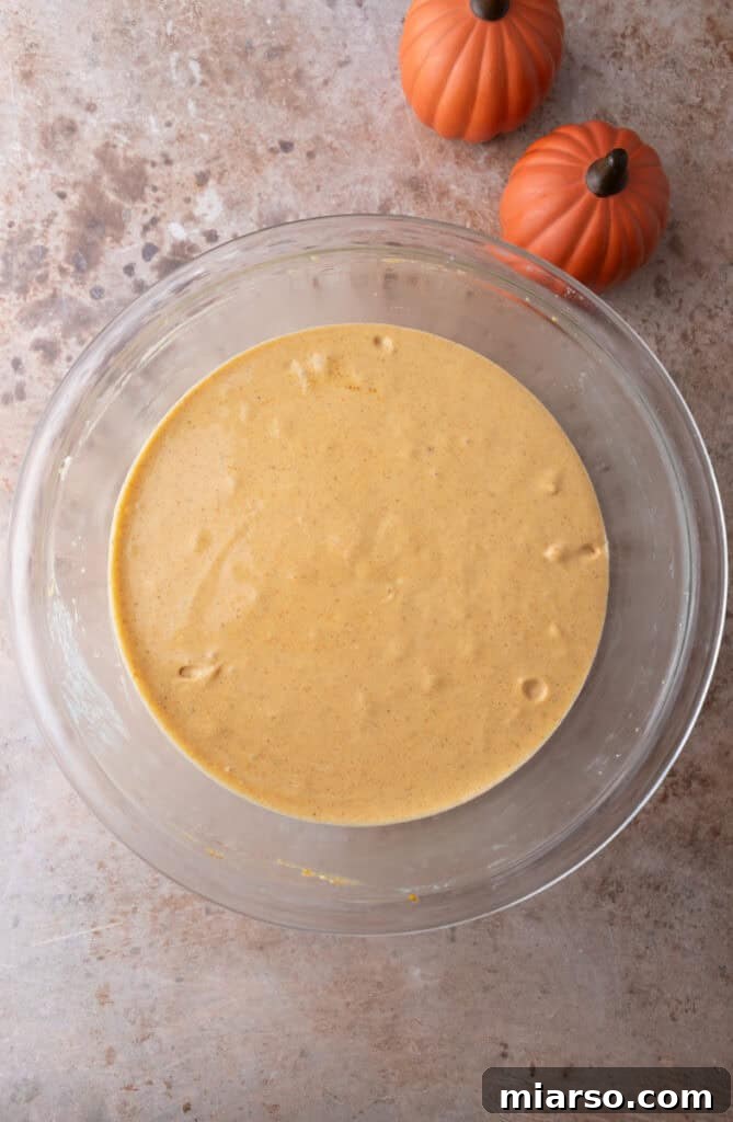 Pumpkin puree and spices mixed into the cheesecake batter