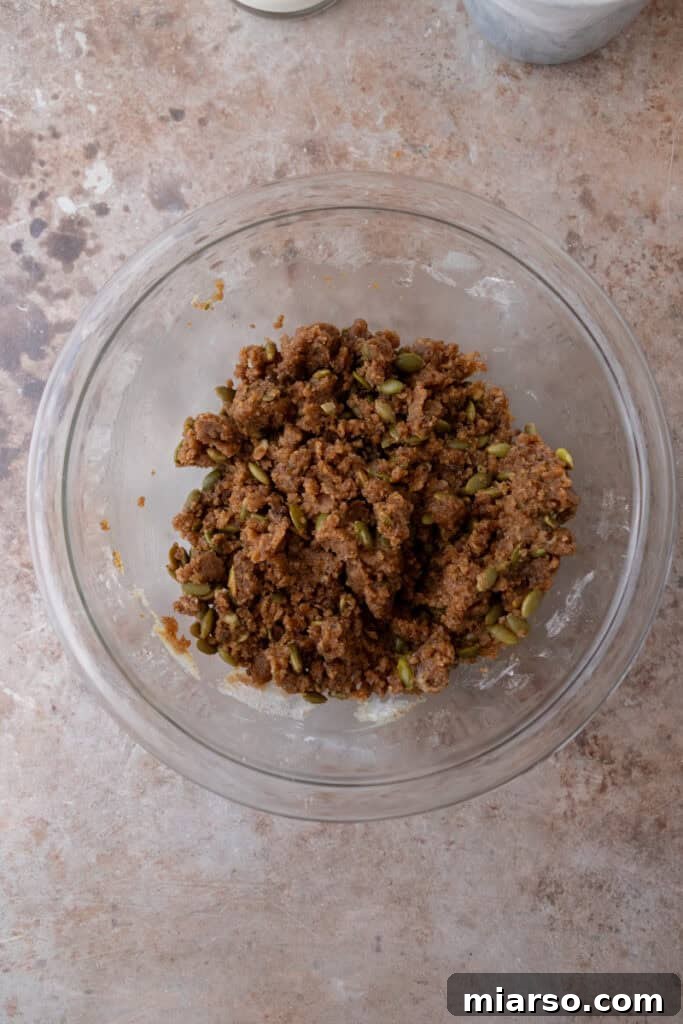 Warm Autumn Pumpkin Streusel Loaf 7 mixed topping ingredients in a bowl