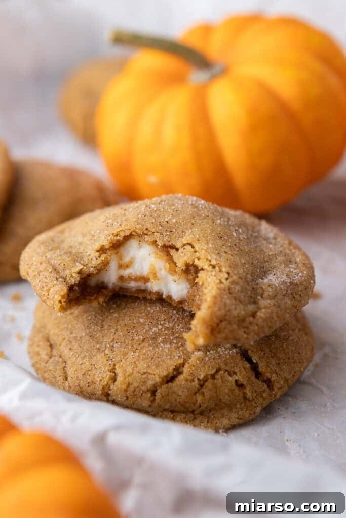 Luscious Pumpkin Cheesecake Cookies 2 Pumpkin Cheesecake Cookies stacked on eachother