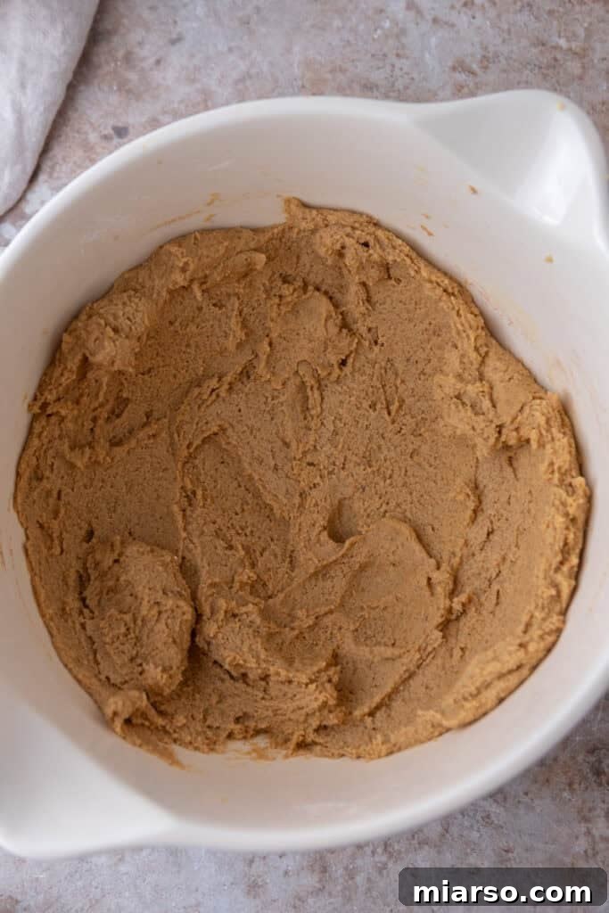 Luscious Pumpkin Cheesecake Cookies 11 mixed ingredients in a bowl