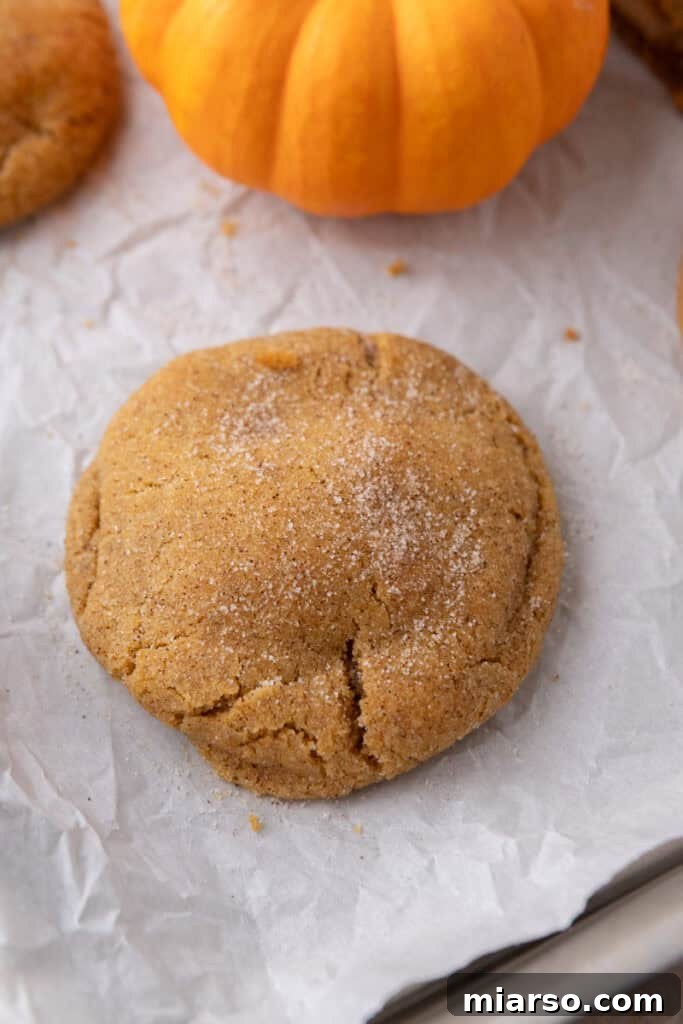 Luscious Pumpkin Cheesecake Cookies 15 baked dough on a baking sheet
