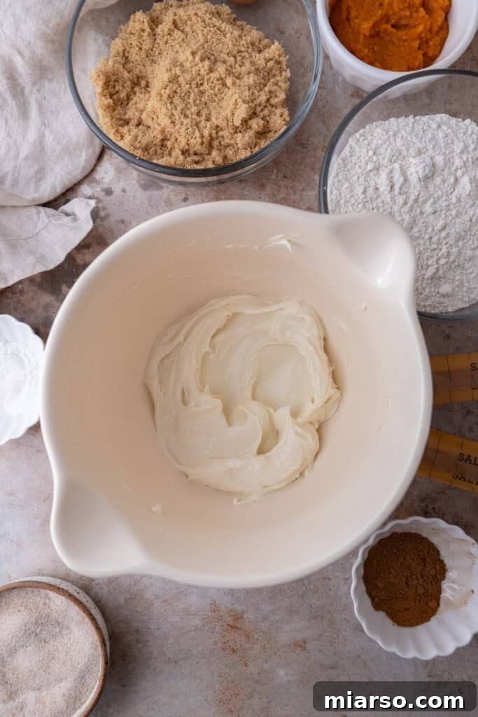 Luscious Pumpkin Cheesecake Cookies 6 filling ingredients in a bowl