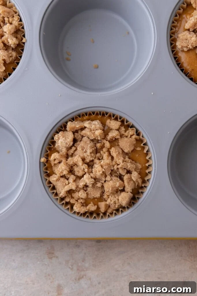 Soft Bakery Pumpkin Muffins Inspired by Panera 12 batter in a pan