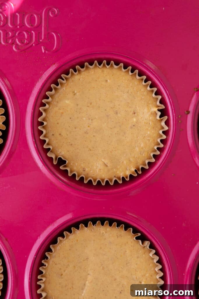 Little Pumpkin Spice Cheesecake Cups 16 baked filling in the muffin liners