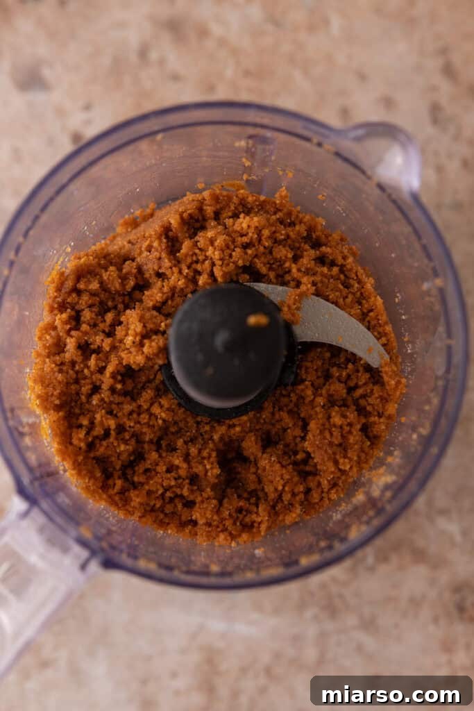 Little Pumpkin Spice Cheesecake Cups 7 ingredients in a food processor