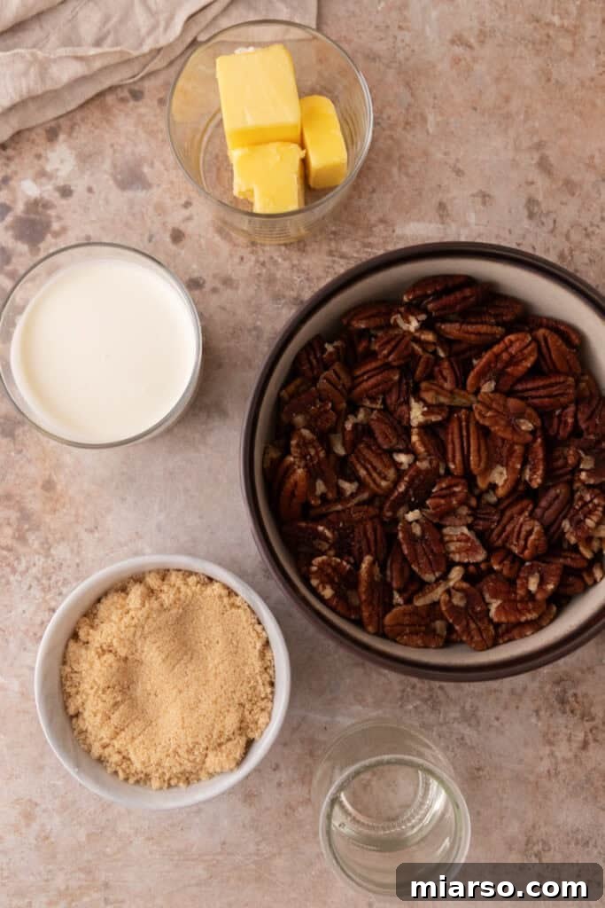 A selection of high-quality baking ingredients ready for assembling the decadent Mini Pecan Pie Cheesecakes.