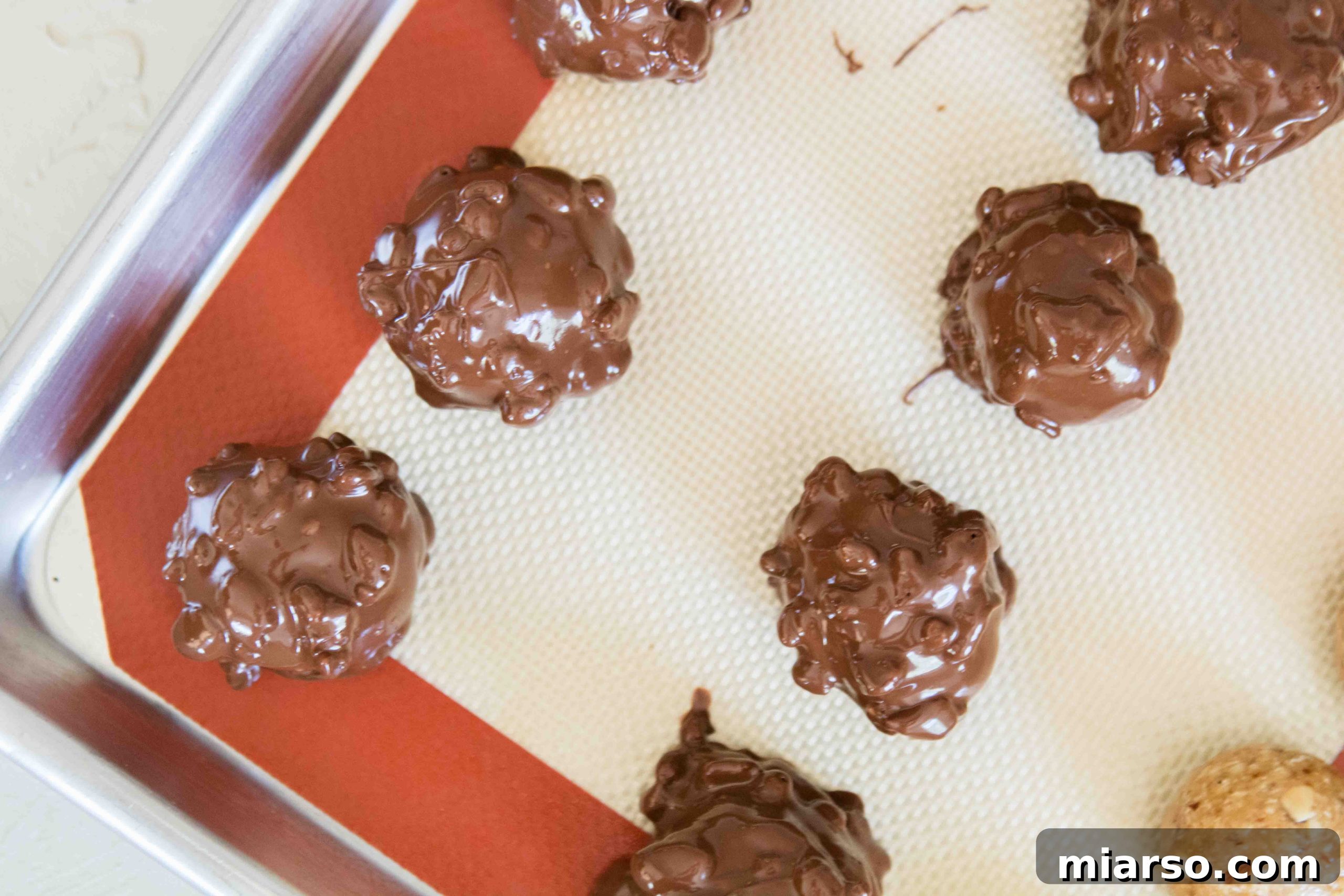 No bake energy balls coated and ready to chill