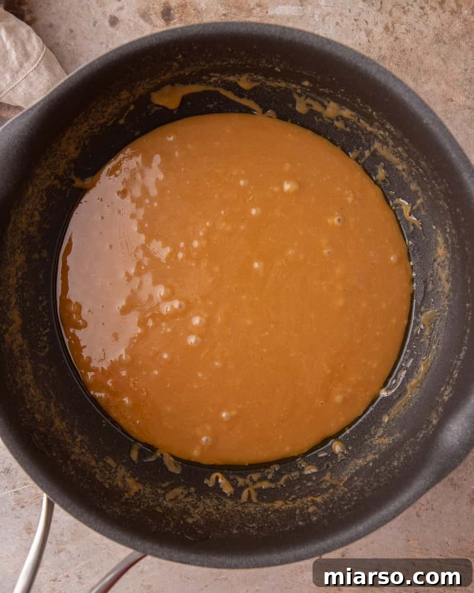 Melted brown sugar and butter toffee mixture in saucepan
