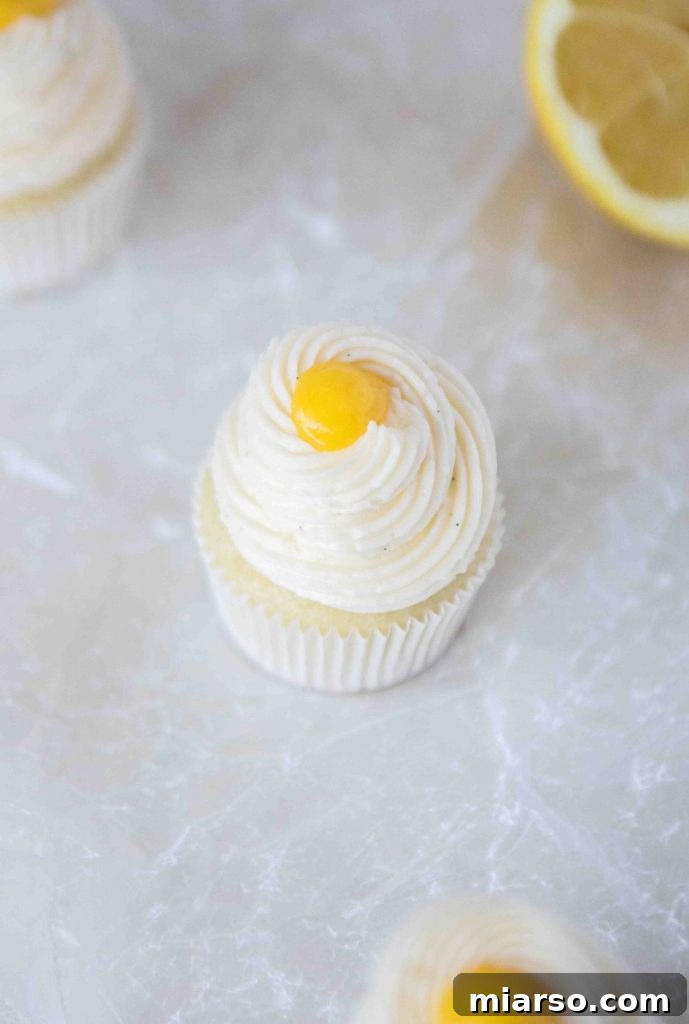 Close-up of mini cupcakes with lemon curd topping
