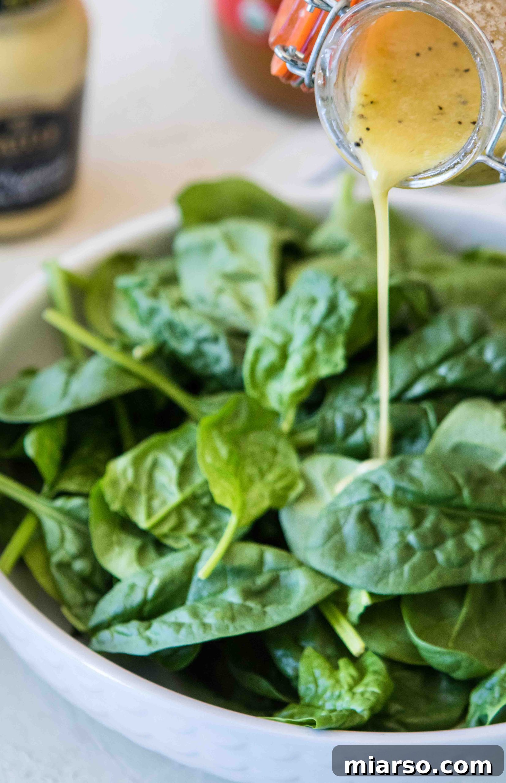 Healthy Apple cider vinegar 5 minute salad dressing with spinach salad