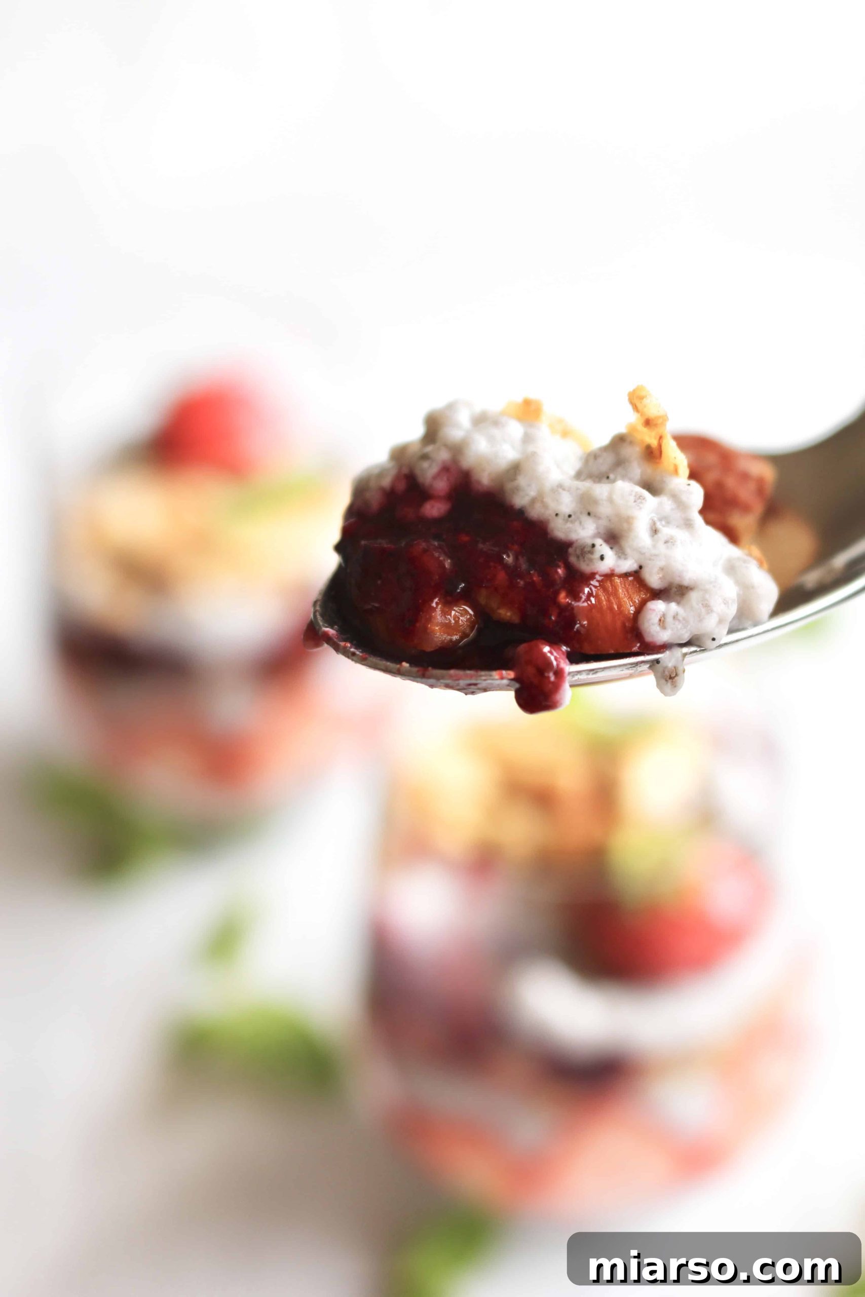 Close-up of Berry Chia Seed Parfait with elegant presentation, showcasing the vibrant colors and fresh berries as a healthy dessert