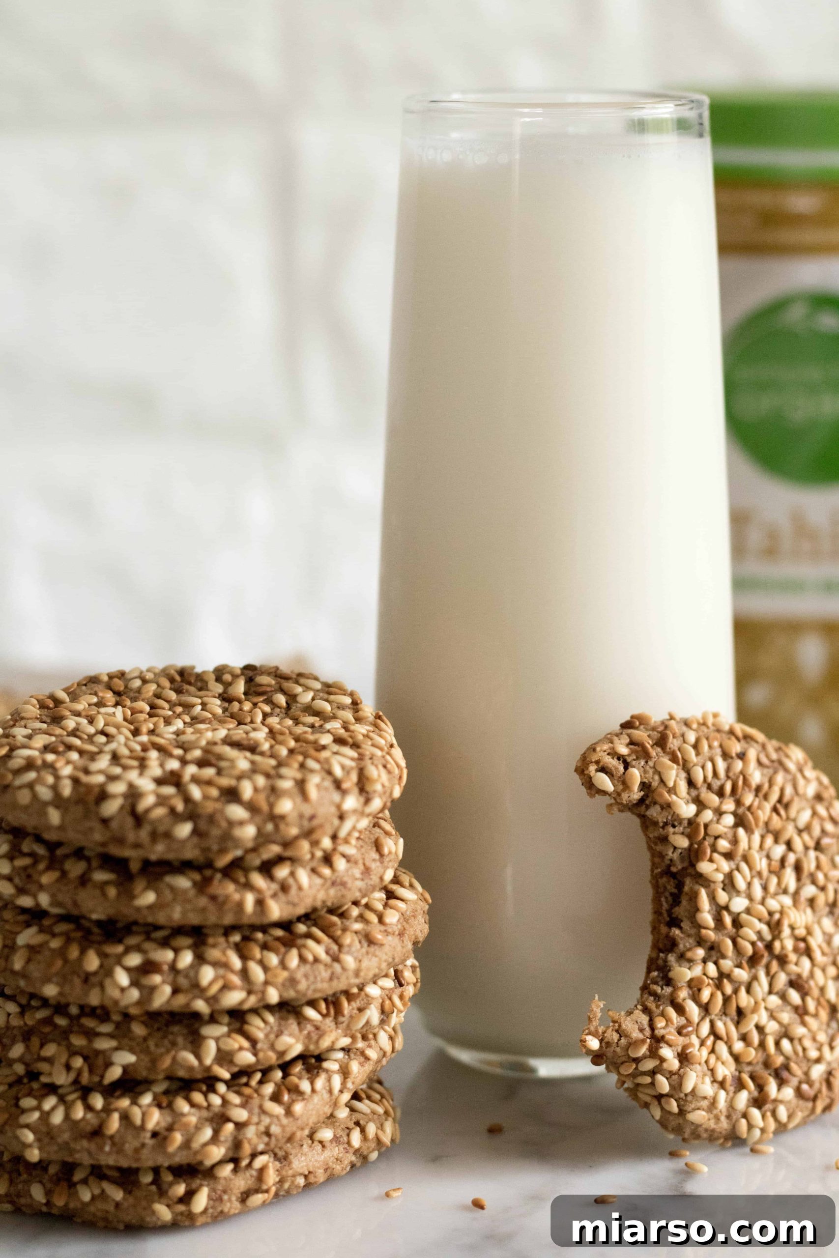 Sesame tahini cookies alongside Simple Truth Organic tahini, demonstrating organic product integration for food bloggers.